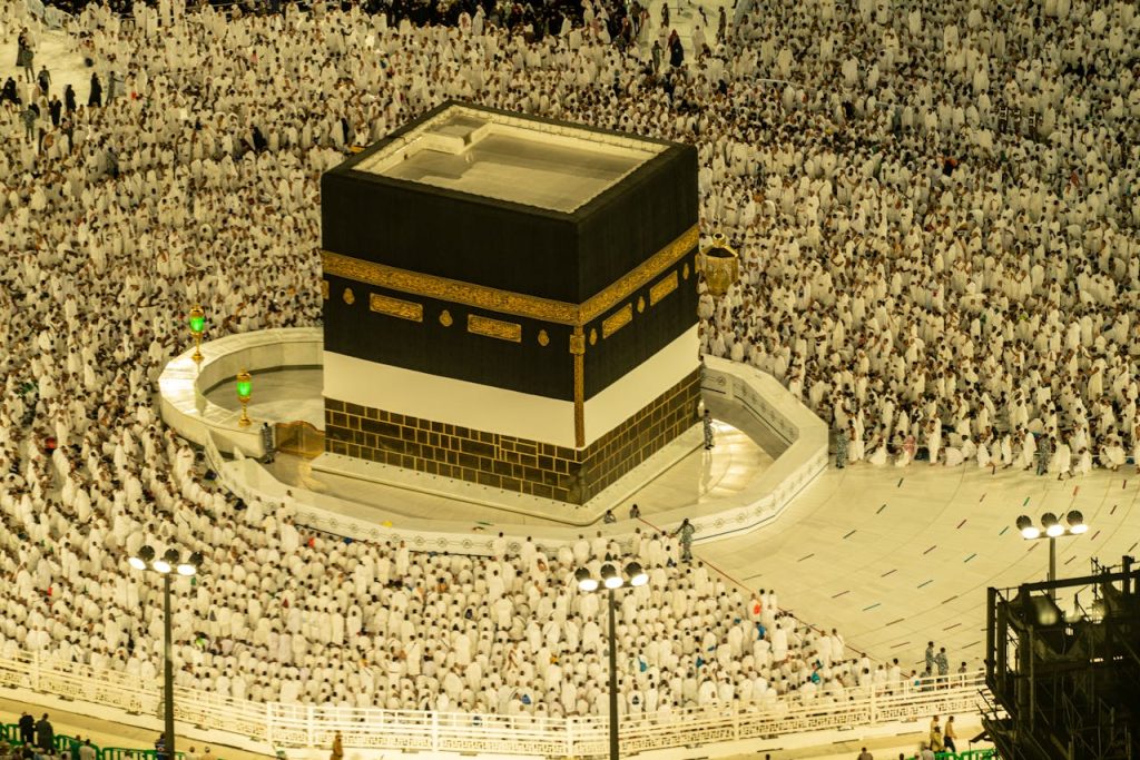 Aerial view of the Kaaba in Mecca, Saudi Arabia, with thousands of pilgrims during Hajj season.